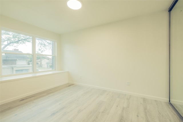12553 Wellington Park Dr, Houston, TX 77072 - unfurnished room featuring light wood-style flooring and baseboards