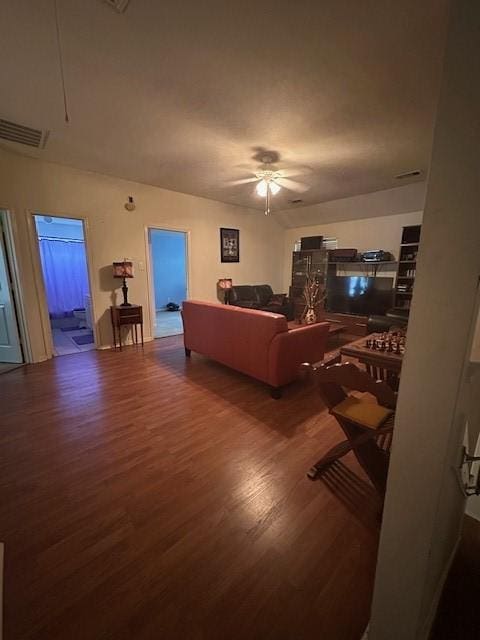 14602 Harcourt Bridge Ct, Houston, TX 77084 - living area with wood finished floors, ceiling fan, and attic access