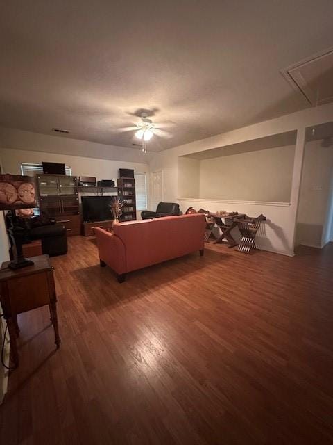 14602 Harcourt Bridge Ct, Houston, TX 77084 - living room featuring wood finished floors, a ceiling fan, and attic access