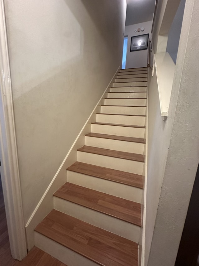 14602 Harcourt Bridge Ct, Houston, TX 77084 - stairway featuring wood finished floors