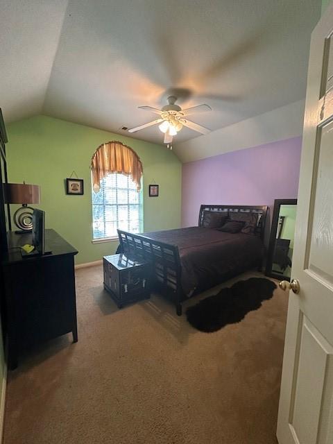 14602 Harcourt Bridge Ct, Houston, TX 77084 - carpeted bedroom with vaulted ceiling and a ceiling fan