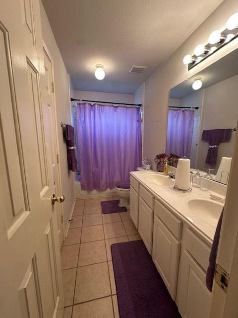 14602 Harcourt Bridge Ct, Houston, TX 77084 - full bath with tile patterned floors, double vanity, toilet, and shower / tub combo with curtain