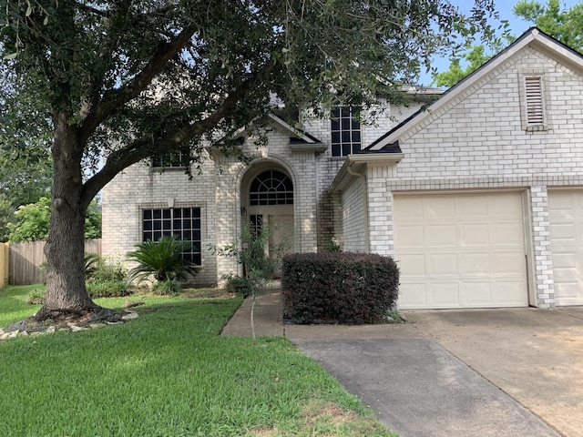 14602 Harcourt Bridge Ct, Houston, TX 77084 - view of front of property with brick siding, concrete driveway, and a garage