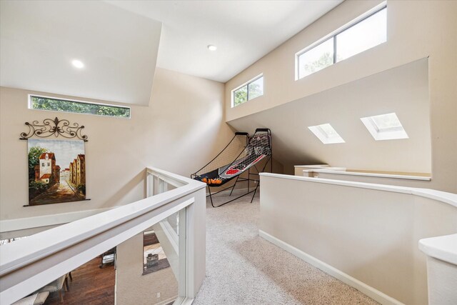 14111 Decker Dr, Magnolia, TX 77355 - stairway with a skylight, baseboards, carpet flooring, and recessed lighting