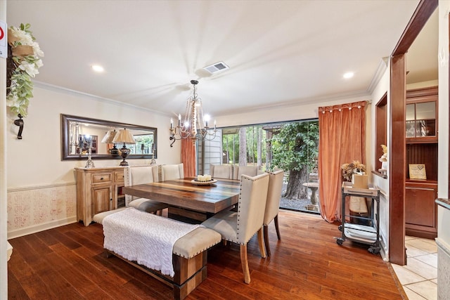 14111 Decker Dr, Magnolia, TX 77355 - dining room featuring ornamental molding, a chandelier, wood finished floors, baseboards, and recessed lighting