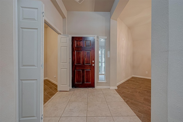 722 Silver Creek Cir, Richmond, TX 77406 - entryway with wood tiled floors and baseboards