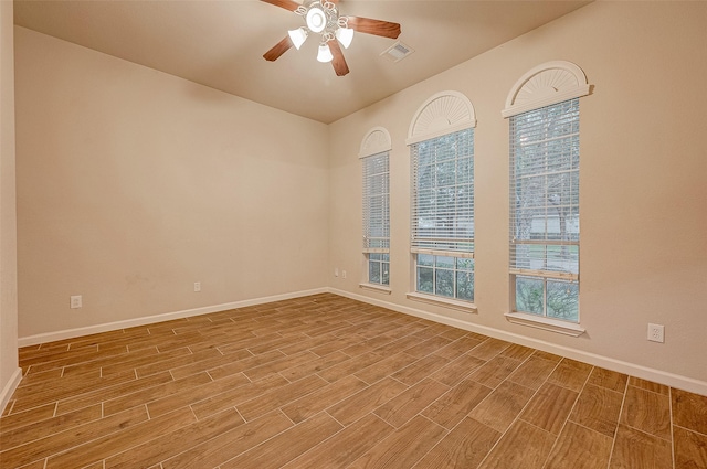 722 Silver Creek Cir, Richmond, TX 77406 - unfurnished room featuring wood finished floors, baseboards, and a ceiling fan