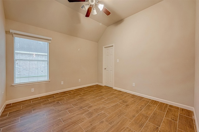 722 Silver Creek Cir, Richmond, TX 77406 - unfurnished room featuring a ceiling fan, light wood-style floors, baseboards, and lofted ceiling