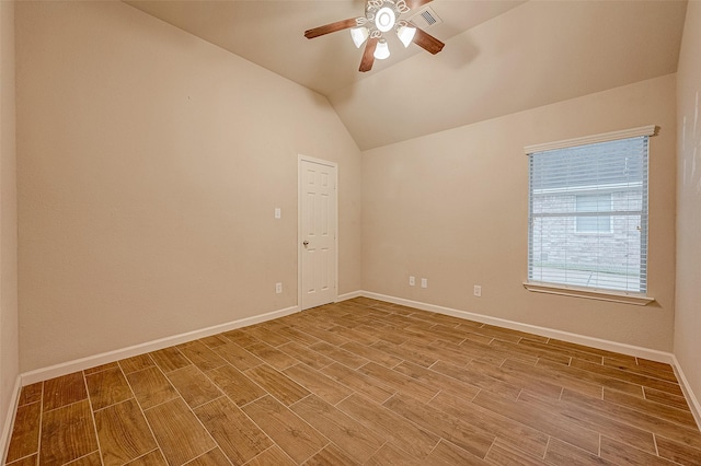 722 Silver Creek Cir, Richmond, TX 77406 - spare room featuring wood finished floors, a ceiling fan, baseboards, and vaulted ceiling