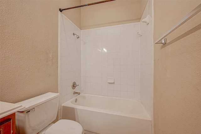 722 Silver Creek Cir, Richmond, TX 77406 - bathroom with a textured wall, toilet,  shower combination, and vanity