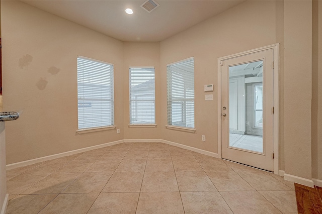 722 Silver Creek Cir, Richmond, TX 77406 - empty room featuring healthy amount of natural light, light tile patterned floors, and baseboards