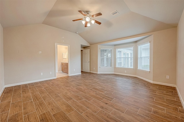 722 Silver Creek Cir, Richmond, TX 77406 - spare room with ceiling fan, vaulted ceiling, light wood finished floors, and baseboards