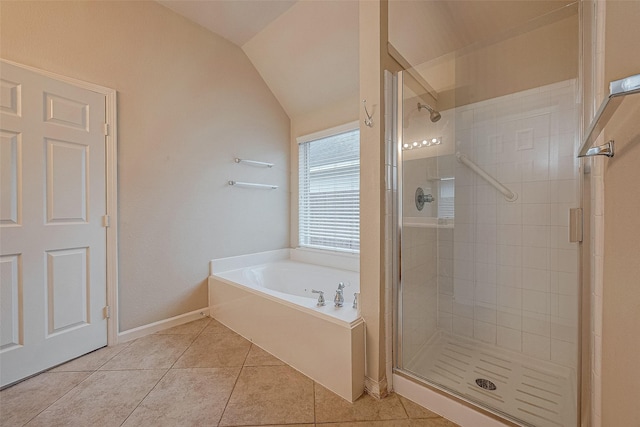 722 Silver Creek Cir, Richmond, TX 77406 - bathroom with a stall shower, a garden tub, tile patterned floors, vaulted ceiling, and baseboards