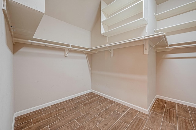 722 Silver Creek Cir, Richmond, TX 77406 - walk in closet featuring wood finish floors