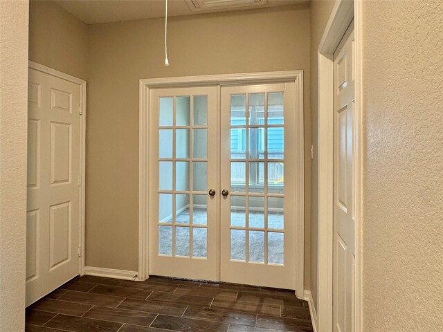 2115 Katalonia Ln, Fresno, TX 77545 - doorway with french doors, wood tiled floors, baseboards, and a textured wall