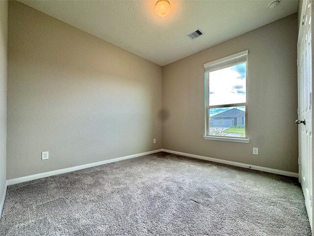 2115 Katalonia Ln, Fresno, TX 77545 - carpeted spare room with baseboards, lofted ceiling, and a textured ceiling