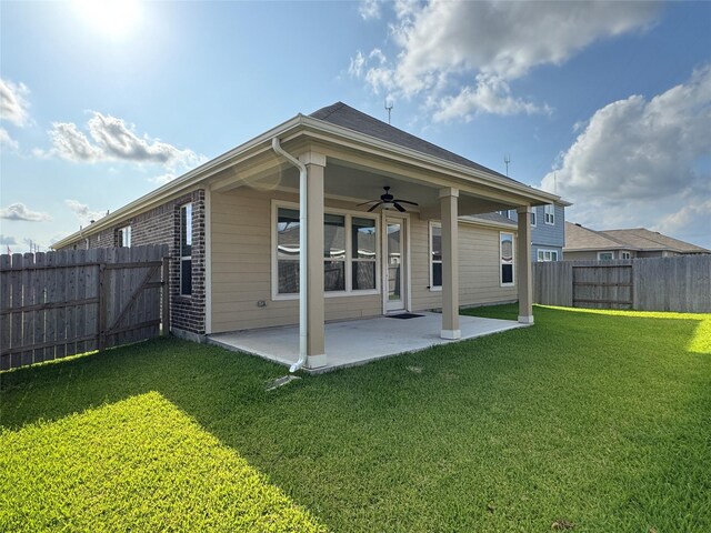 2115 Katalonia Ln, Fresno, TX 77545 - rear view of house featuring a ceiling fan and a patio