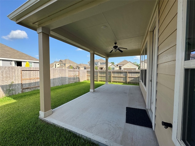 2115 Katalonia Ln, Fresno, TX 77545 - view of patio with a ceiling fan and a residential view