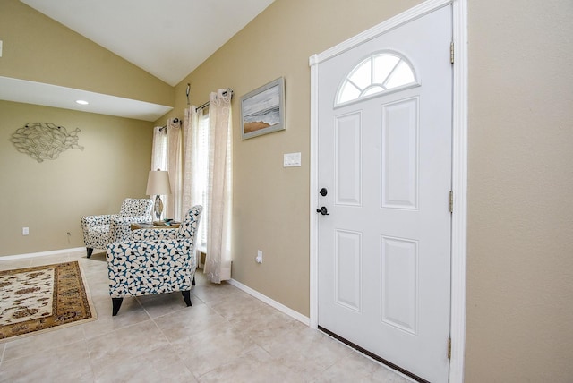 880 Swallow Dr, Palacios, TX 77465 - foyer featuring vaulted ceiling and light tile patterned floors