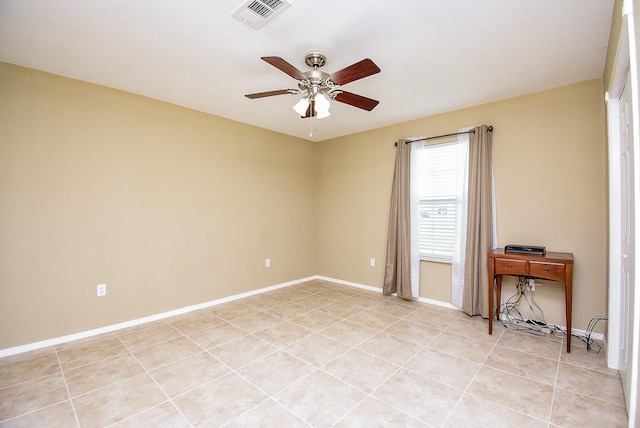 880 Swallow Dr, Palacios, TX 77465 - unfurnished room with a ceiling fan and light tile patterned floors
