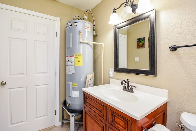 880 Swallow Dr, Palacios, TX 77465 - bathroom with electric water heater, vanity, and a chandelier