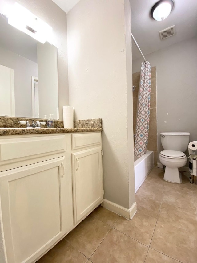 8323 Wilcrest Dr Unit 2006, Houston, TX 77072 - bathroom with toilet, tile patterned floors, vanity, shower / tub combo with curtain, and baseboards