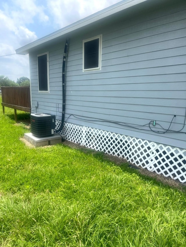 3207 Stella Rd, Brookshire, TX 77423 - view of side of property featuring central air condition unit and a yard