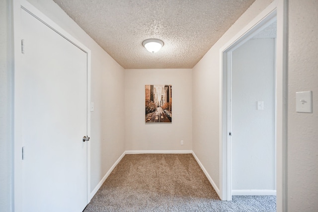 9306 Chesterfield Dr, Houston, TX 77051 - carpeted spare room featuring a textured ceiling and baseboards