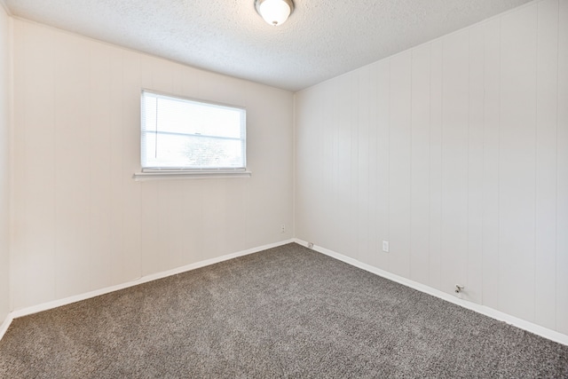 9306 Chesterfield Dr, Houston, TX 77051 - unfurnished room featuring a textured ceiling and carpet floors