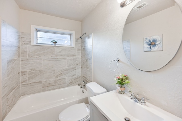 9306 Chesterfield Dr, Houston, TX 77051 - bathroom featuring toilet,  shower combination, vanity, and a textured wall