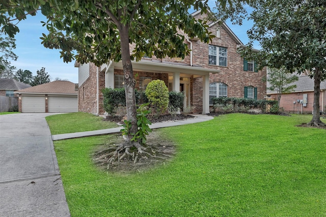 2618 Bridgestone Park Ln, Spring, TX 77386 - view of front of house featuring brick siding and a detached garage