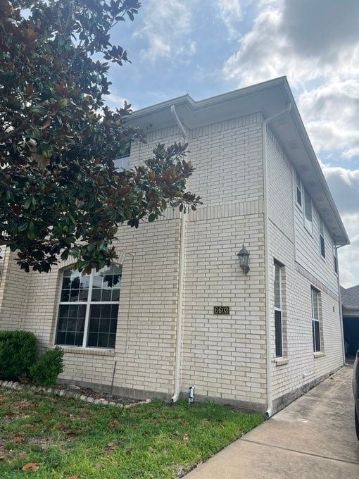 6603 Golden View Ct, Houston, TX 77083 - view of property exterior featuring brick siding