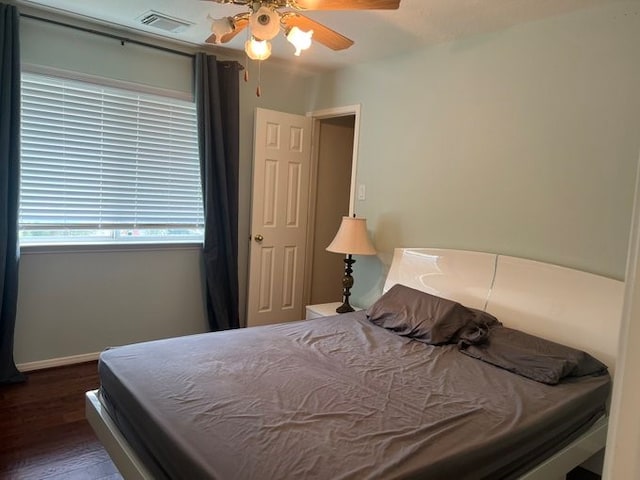 6603 Golden View Ct, Houston, TX 77083 - bedroom with wood finished floors, a ceiling fan, and baseboards