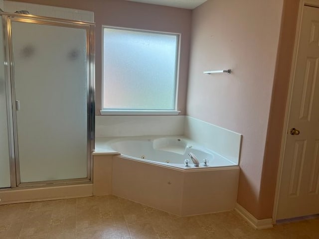 6603 Golden View Ct, Houston, TX 77083 - bathroom with a shower stall and a jetted tub