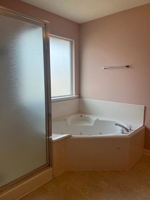 6603 Golden View Ct, Houston, TX 77083 - full bath with a stall shower and a jetted tub