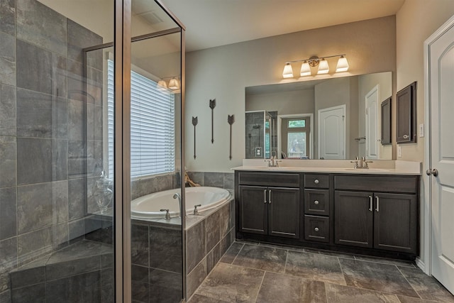 110 Mayhaven Ct, Montgomery, TX 77316 - bathroom featuring double vanity, a stall shower, and a bath