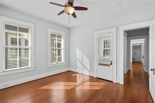 801 University Blvd, Galveston, TX 77550 - unfurnished room featuring wood-type flooring, baseboards, and a ceiling fan