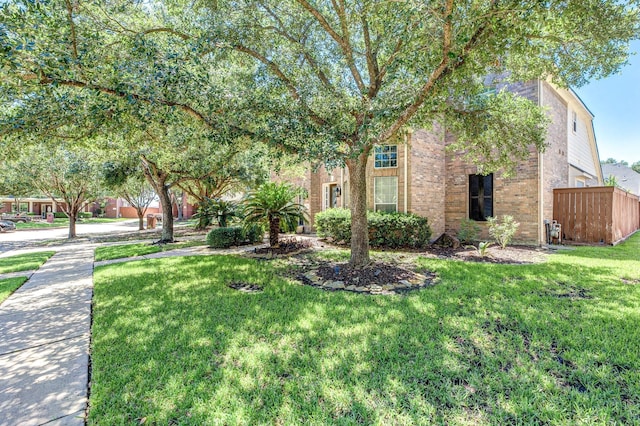 12515 Country Arbor Ln, Houston, TX 77041 - view of property hidden behind natural elements featuring brick siding