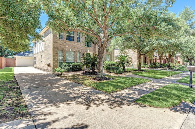 12515 Country Arbor Ln, Houston, TX 77041 - view of front facade featuring a garage, concrete driveway, and brick siding