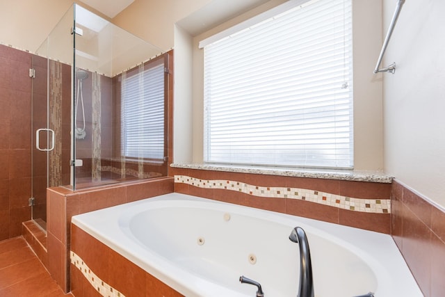 12515 Country Arbor Ln, Houston, TX 77041 - bathroom with a stall shower, a jetted tub, and tile patterned flooring