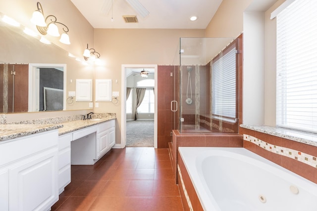 12515 Country Arbor Ln, Houston, TX 77041 - bathroom featuring a ceiling fan, double vanity, a tub with jets, a stall shower, and tile patterned floors