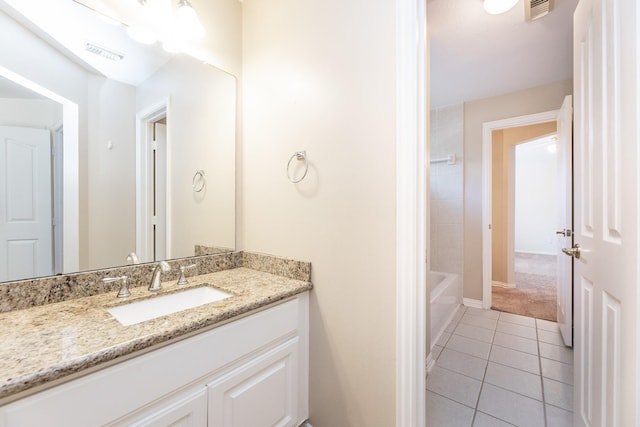 12515 Country Arbor Ln, Houston, TX 77041 - full bath featuring tile patterned flooring, vanity, baseboards, and bathtub / shower combination