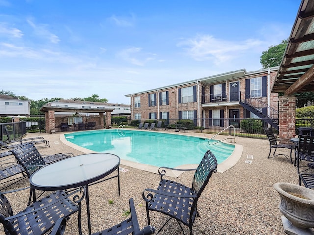 6402 Del Monte Dr Unit 20, Houston, TX 77057 - community pool featuring a patio