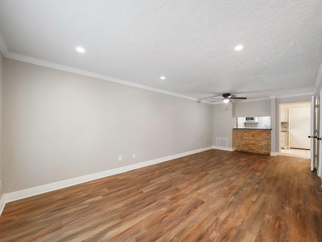 6402 Del Monte Dr Unit 20, Houston, TX 77057 - unfurnished living room featuring a ceiling fan, wood finished floors, baseboards, ornamental molding, and recessed lighting