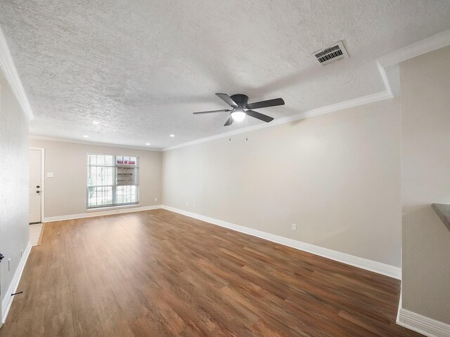 6402 Del Monte Dr Unit 20, Houston, TX 77057 - unfurnished room with wood finished floors, a textured ceiling, ornamental molding, a ceiling fan, and baseboards