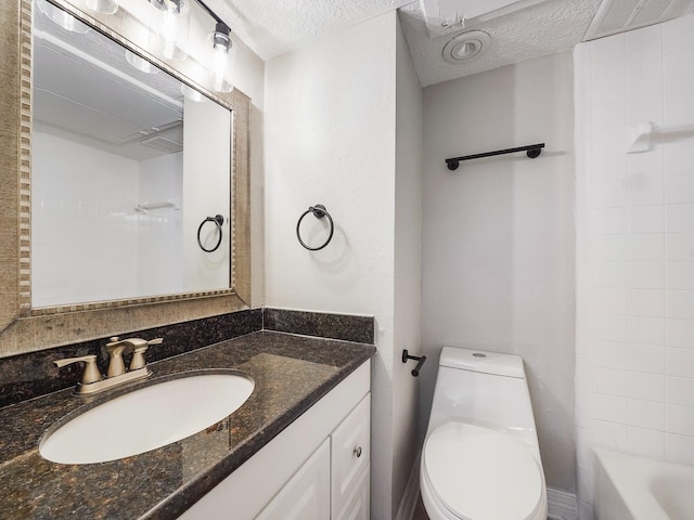 6402 Del Monte Dr Unit 20, Houston, TX 77057 - bathroom featuring vanity, toilet, a textured ceiling, and shower / tub combination