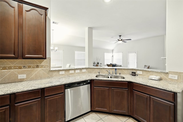 22210 Pacific Ocean Dr, Spring, TX 77388 - kitchen with stainless steel dishwasher, a sink, backsplash, ceiling fan, and light stone counters