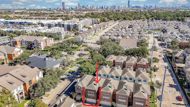 8642 Meadowcroft Dr, Houston, TX 77063 - aerial perspective of suburban area featuring city skyline