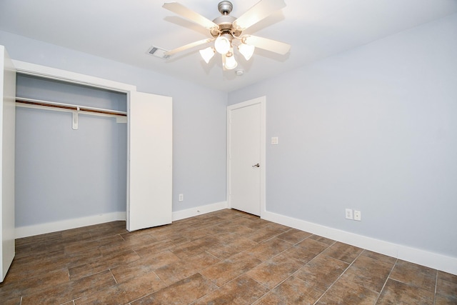 8642 Meadowcroft Dr, Houston, TX 77063 - unfurnished bedroom featuring a closet, baseboards, and ceiling fan