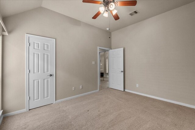 2512 Garnetfield Ln, Friendswood, TX 77546 - unfurnished bedroom with carpet floors, baseboards, vaulted ceiling, and ceiling fan